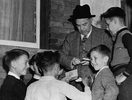 Original title:  Rt. Hon. W.L. Mackenzie King, Prime Minister of Canada, with children, on the day of the plebiscite concerning the introduction of conscription. 