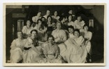 Original title:  Margaret Addison seated on the Annesley staircase with a group of women. Circa February 1917. Image courtesy of Victoria University Archives (Toronto, Ont.).