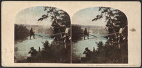 Original title:      This image is a JPEG version of the original PNG image at File:Blondin's_Tight_Rope_Feat_-_Crossing_the_Niagara,_from_Robert_N._Dennis_collection_of_stereoscopic_views_2.png. Generally, this JPEG version should be used when displaying the file from Commons, in order to reduce the file size of thumbnail images. However, any edits to the image should be based on the original PNG version in order to prevent generation loss, and both versions should be updated. Do not make edits based on this version. Admins: Although this file is a scaled-down duplicate, it should not be deleted! See here for more information. Deutsch | English | español | français | македонски | മലയാളം | português | русский | +/−

Artist Unknown Title Blondin's Tight Rope Feat : Crossing the Niagara. Date Coverage: [1858?-1859?]. Digital item published 12-1-2005; updated 12-5-2008. Medium albumen print Current l