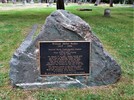 Original title:  "This bronze plaque set in a boulder brought here from Barkerville, was erected in 2008 to replace the flat bronze plaque that had marked his grave since 1962." 
Source: The Old Cemeteries Society of Victoria
