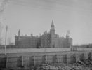 Original title:  Mercer Reformatory (Toronto, Canada). A growing awareness that female prisoners had different needs than male prisoners led to the establishment of the first prison for women in Canada in 1874. The objective of the Andrew Mercer Reformatory was to create a homelike atmosphere for its female inmates and to teach them the skills necessary to lead a decent life once their sentence expired. The training offered was intended to instill feminine Victorian virtues such as obedience and servility. Demolished in late 1969, it is now the site of Lamport Stadium.
Credit: F. W. Micklethwaite - This image is available from Library and Archives Canada under the reproduction reference number e003894555 and under the MIKAN ID number 3592998.