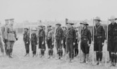 Original title:  Brigadier-General E.A. Cruikshank reviewing a group of cadets, possibly Boy Scouts. Date: 1915. 