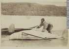 Original title:  Photograph Butchering a whale, Little Whale River, QC, 1872 James Laurence Cotter 1872, 19th century Silver salts on paper mounted on card - Albumen process 10 x 15 cm Gift of Mrs. D. A. Murray MP-0000.391.7 © McCord Museum Keywords:  Ethnology (606) , Inuit (216) , Photograph (77678)