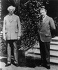 Original title:  Rt. Hon. Sir Wilfrid Laurier and William Lyon Mackenzie King at Sydney Fisher's home. 