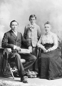 Original title:  "Reverend Egerton R. Steinhauer and Mrs. Steinhauer with son Wesley.", n.d., (CU196498) by Steele and Company. Courtesy of Glenbow Library and Archives Collection, Libraries and Cultural Resources Digital Collections, University of Calgary.