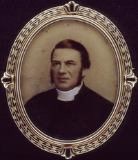 Titre original&nbsp;:  Hand-coloured solar print of The Venerable Dr. James Hunter (1817-1882). Portrait taken from a reversible gold broach. 