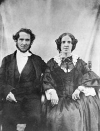 Original title:    Description Robert Terrill Rundle and his wife Mary Wolverson Date circa 1860(1860) Source Glenbow Archives Author Unknown Permission (Reusing this file) n/a - public domain

