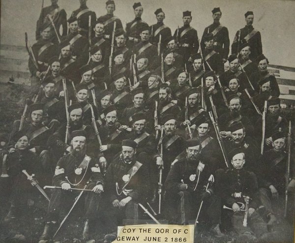 Original title:  Black and white photo of 53 soldiers in the No. 1 Company of the QOR of C. in Ridgeway June 2, 1866.