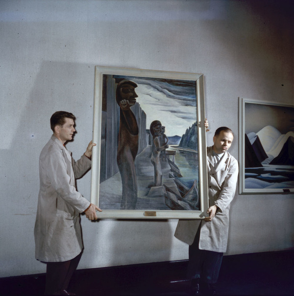 Original title:  MIKAN 4316627 Two men installing Emily Carr&#39;s painting, Blunden Harbour, at the National Gallery of Canada  [between 1955-1963] [168 KB, 1000 X 1009]